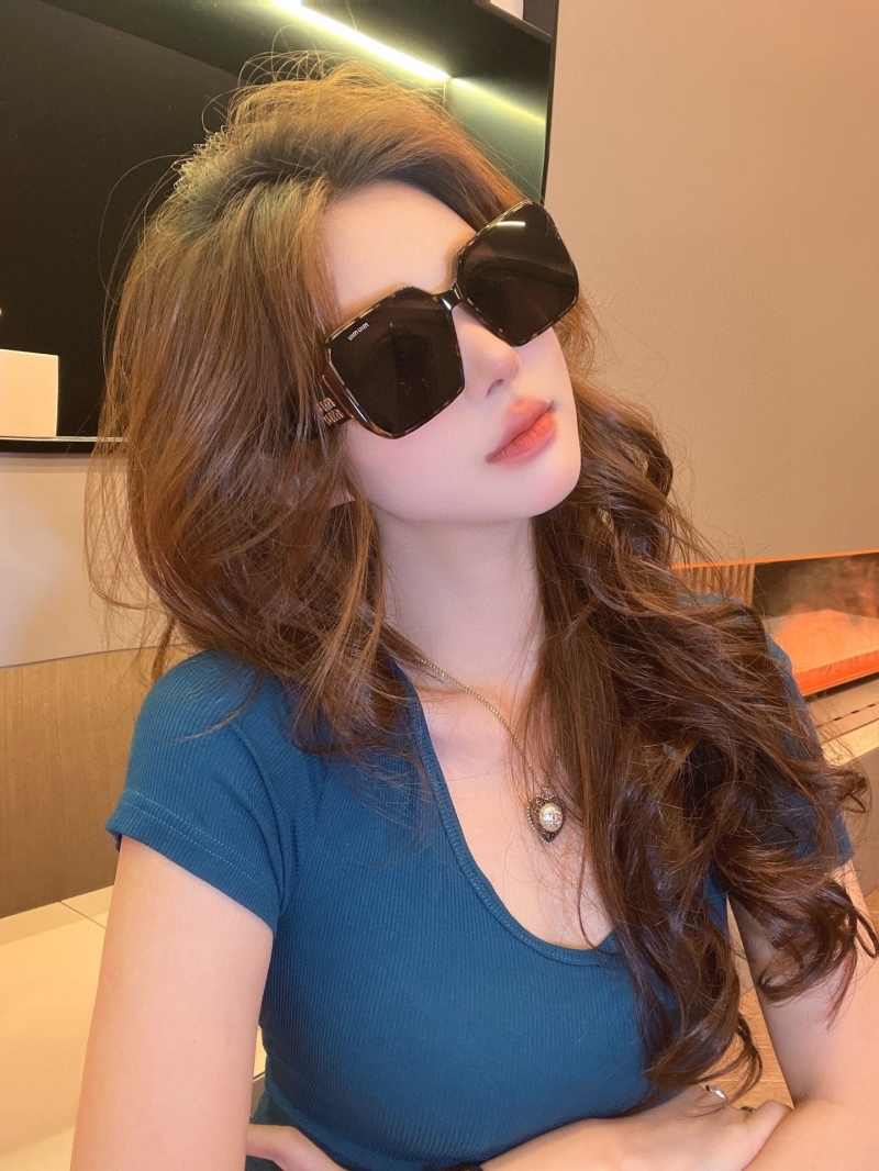 Miu miu Sunglasses